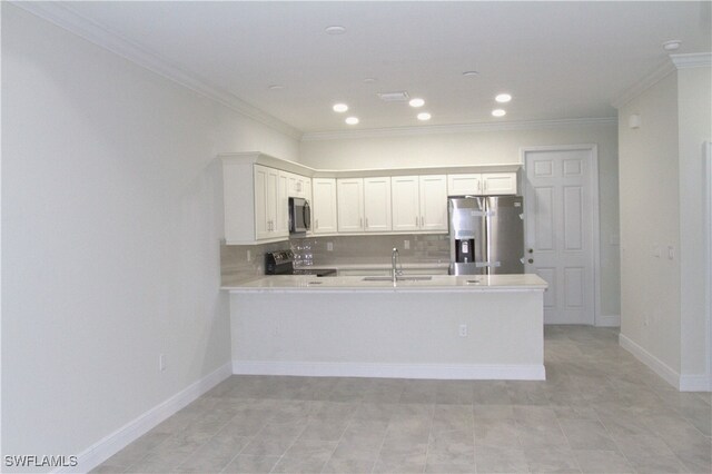 2406/2404 Hawalaska St, Lehigh Acres, FL 33973 - kitchen featuring stainless steel appliances, crown molding, a peninsula, light countertops, and a sink