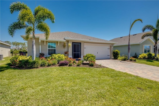 single story home featuring a front lawn, a garage, stucco siding, cooling unit, and decorative driveway