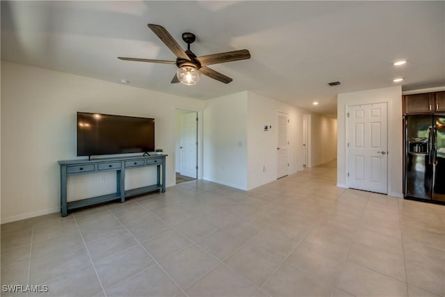 unfurnished living room featuring visible vents, recessed lighting, baseboards, and ceiling fan