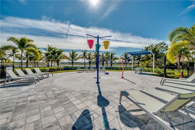 view of property's community with fence