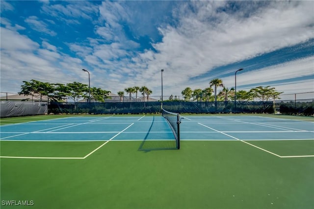 view of sport court featuring fence and community basketball court