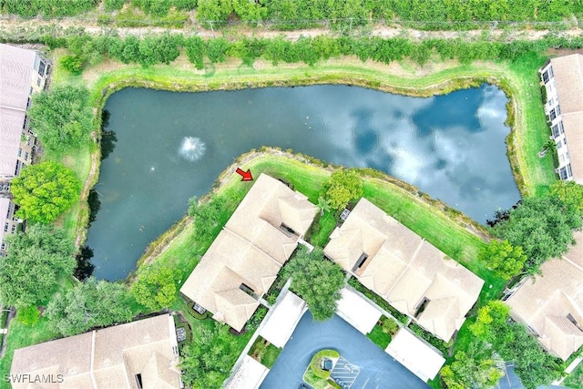birds eye view of property featuring a water view