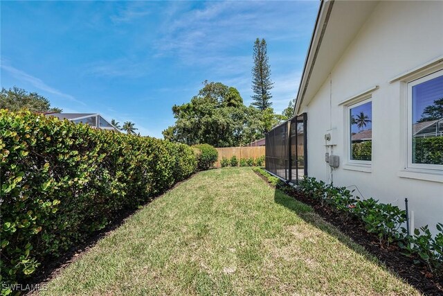 1196 Westlake Blvd, Naples, FL 34103 - view of yard featuring fence