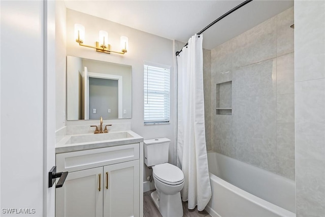 1196 Westlake Blvd, Naples, FL 34103 - bathroom featuring vanity, wood finished floors, shower / bath combo, and toilet