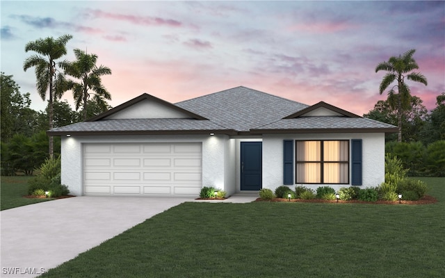ranch-style house featuring a yard, an attached garage, concrete driveway, and stucco siding