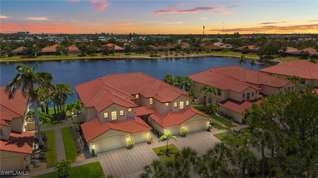 aerial view with a water view and a residential view