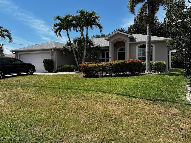 4152 Country Club Blvd, Cape Coral, FL 33904 - single story home with stucco siding, an attached garage, and a front lawn