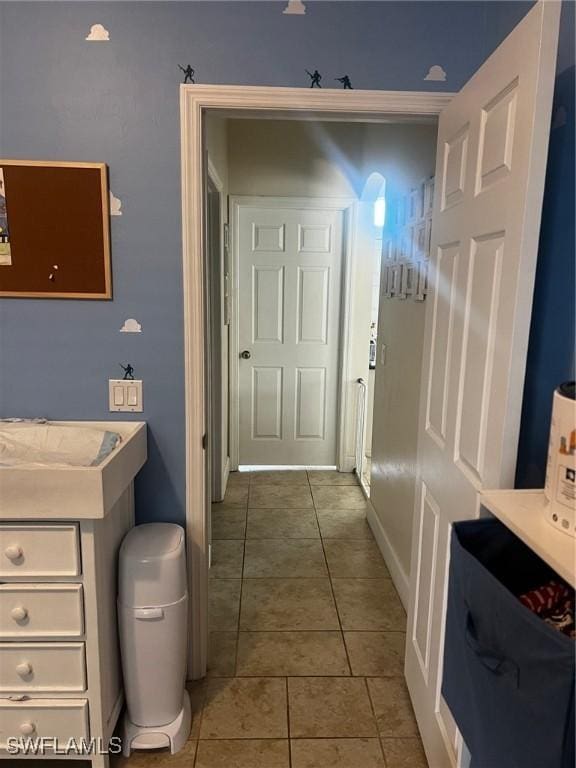 4152 Country Club Blvd, Cape Coral, FL 33904 - bathroom featuring tile patterned flooring and baseboards