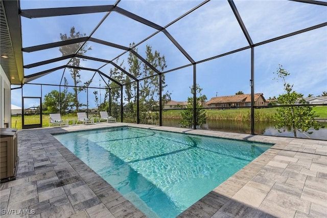 pool featuring a lanai and a patio area