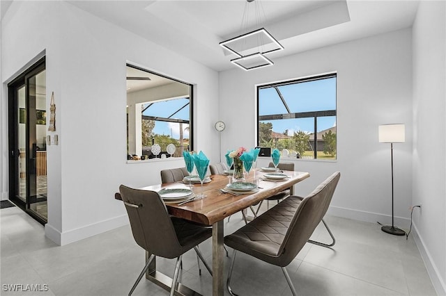 dining room with baseboards