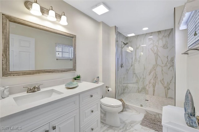 4500 Botanical Place Cir Unit 301, Naples, FL 34112 - bathroom featuring vanity, toilet, a marble finish shower, marble finish floor, and recessed lighting