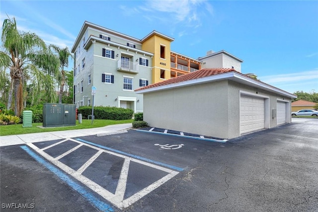 4500 Botanical Place Cir Unit 301, Naples, FL 34112 - view of uncovered parking lot