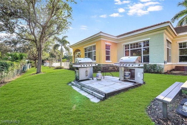 4500 Botanical Place Cir Unit 301, Naples, FL 34112 - view of yard featuring fence and a patio area