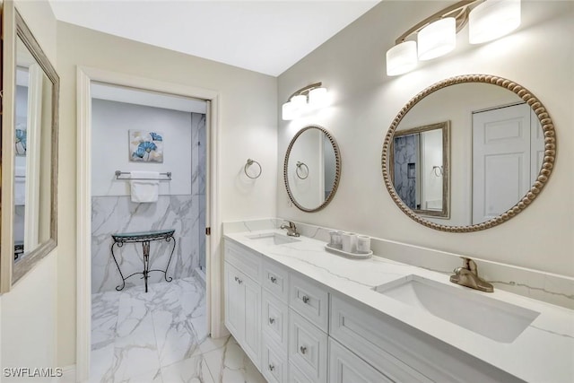 4500 Botanical Place Cir Unit 301, Naples, FL 34112 - full bathroom with double vanity, a sink, and marble finish floor