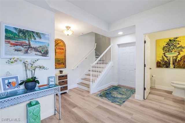 4500 Botanical Place Cir Unit 301, Naples, FL 34112 - staircase with baseboards, recessed lighting, and wood finished floors