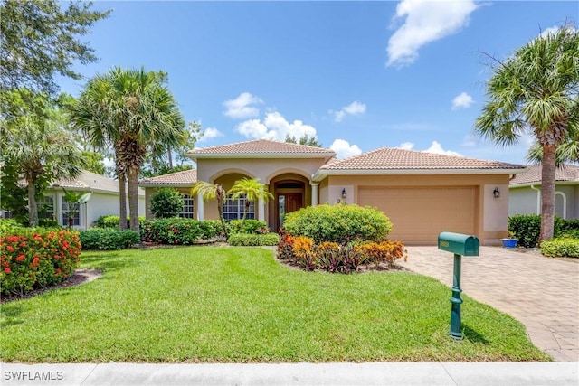 3919 Aurora Ct, Naples, FL 34116 - mediterranean / spanish house with a garage, stucco siding, and a front lawn