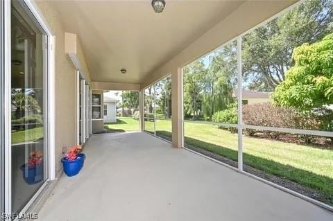 3919 Aurora Ct, Naples, FL 34116 - view of unfurnished sunroom