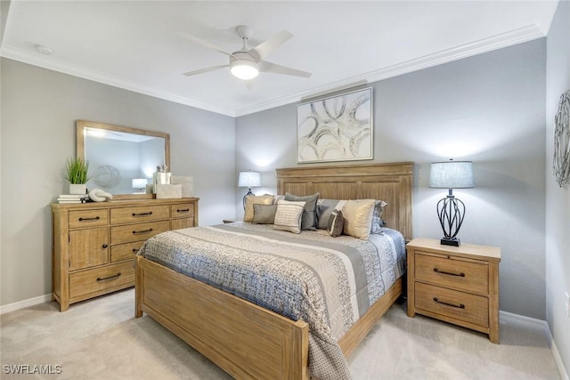 bedroom featuring baseboards, light colored carpet, ornamental molding, and ceiling fan
