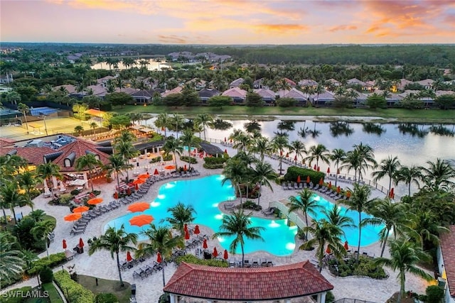9590 Trevi Ct Unit 5323, Naples, FL 34113 - drone / aerial view of a pool and a large body of water