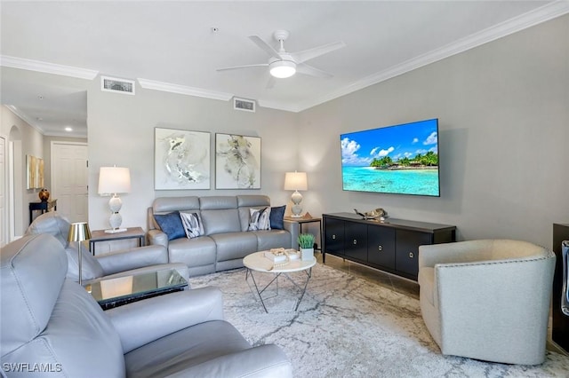living area with ceiling fan, visible vents, and ornamental molding