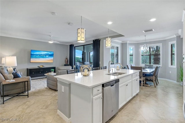 kitchen with crown molding, visible vents, open floor plan, a sink, and dishwasher