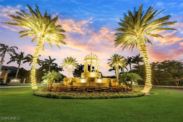 9590 Trevi Ct Unit 5323, Naples, FL 34113 - surrounding community featuring a lawn