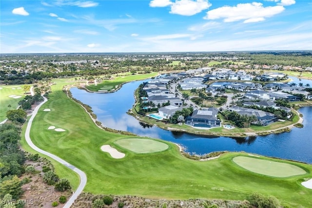 birds eye view of property with a water view, golf course view, and a residential view