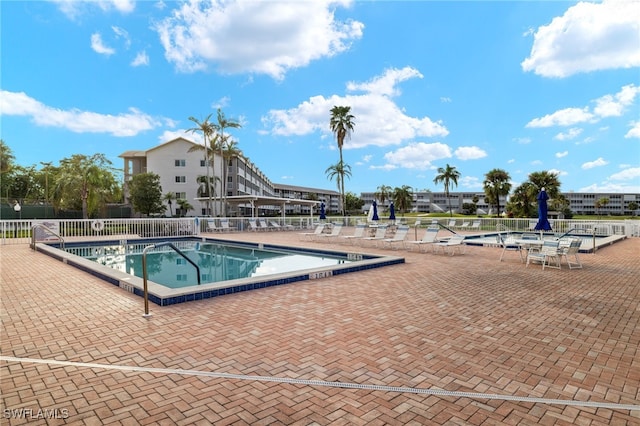 14771 Hole In 1 Cir Unit 106, Fort Myers, FL 33919 - community pool featuring fence and a patio area