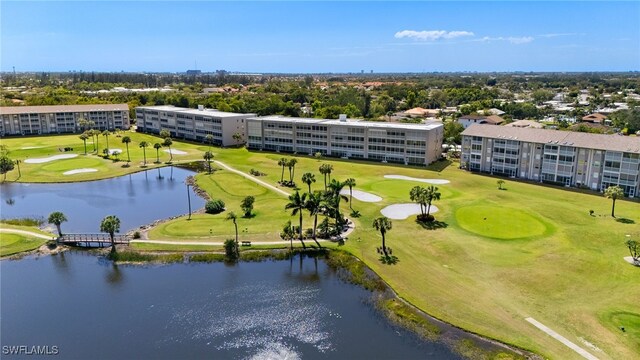 14771 Hole In 1 Cir Unit 106, Fort Myers, FL 33919 - drone / aerial view with a water view and view of golf course