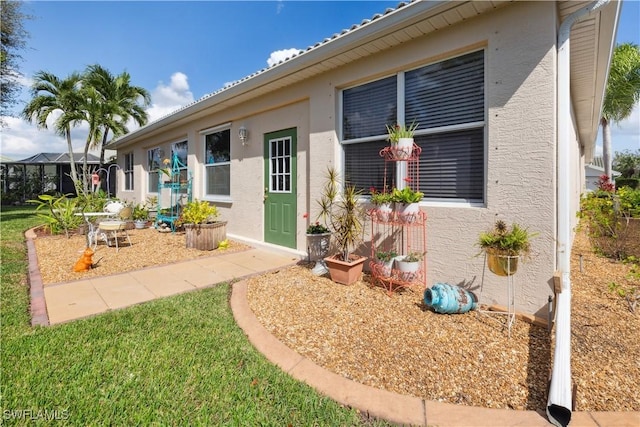 20849 Santorini Way N, Fort Myers, FL 33917 - entrance to property featuring stucco siding