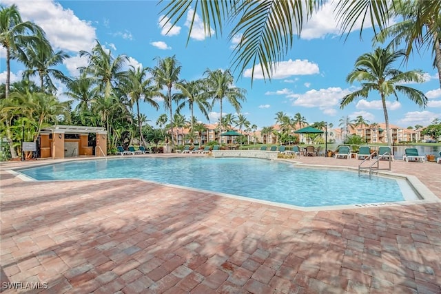 community pool featuring a patio area
