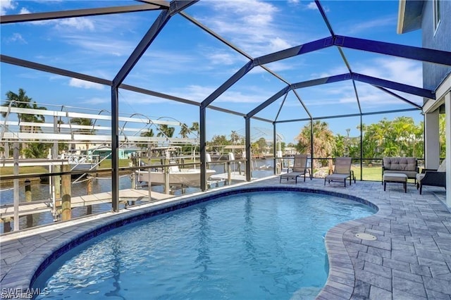 outdoor pool featuring boat lift, a patio, a boat dock, a water view, and glass enclosure