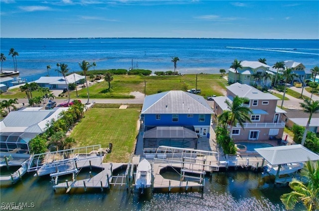 drone / aerial view with a water view