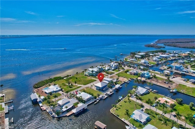 bird's eye view with a residential view and a water view