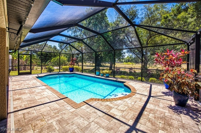 pool featuring a patio area and a lanai