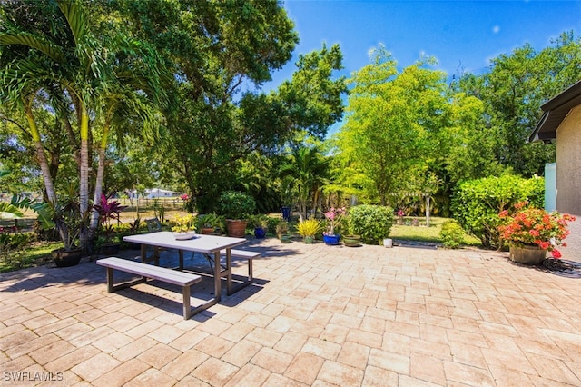 view of patio featuring outdoor dining area