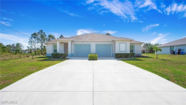 view of front of property featuring concrete driveway, stucco siding, a front yard, and a garage