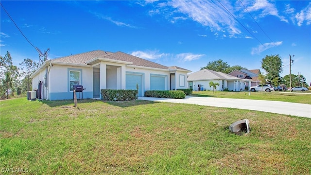 view of front of house featuring an attached garage, concrete driveway, stucco siding, and a front yard
