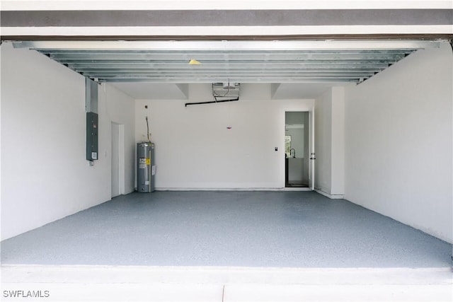 garage featuring a garage door opener, water heater, and electric panel