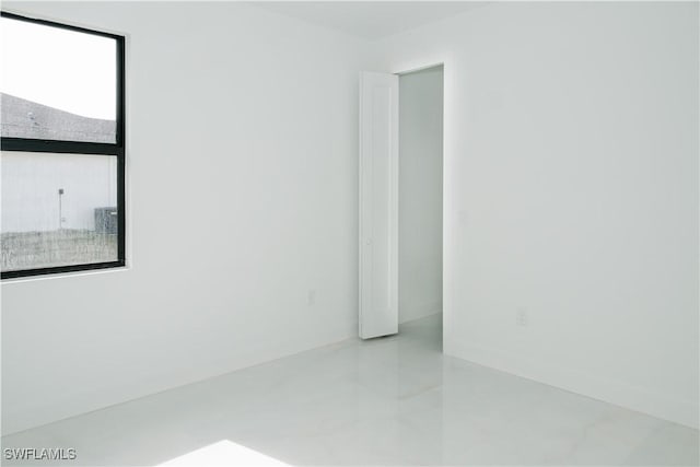 view of tiled spare room