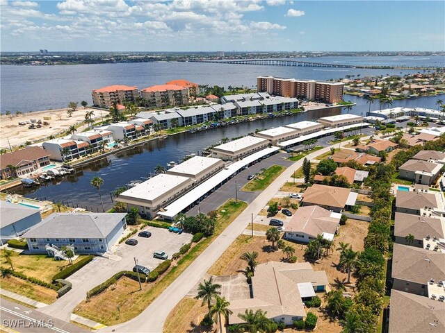 4211 SE 19th Pl Unit 1C, Cape Coral, FL 33904 - aerial view of a large body of water, a notable bridge, and apartment complex / building