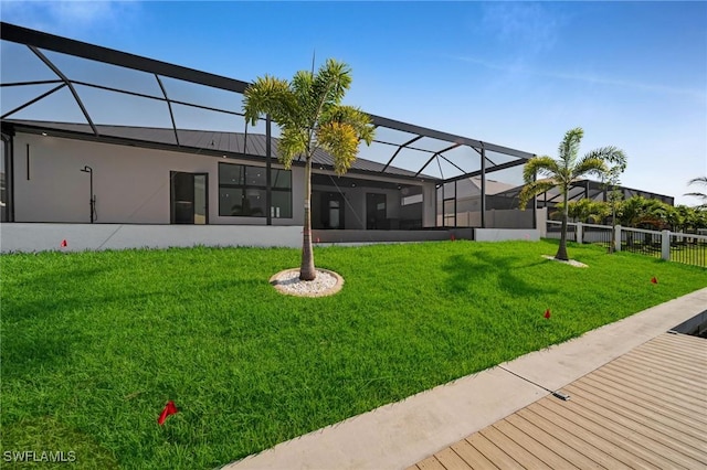 3617 Embers Pkwy W, Cape Coral, FL 33993 - back of property featuring glass enclosure and stucco siding