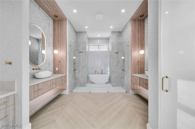 full bath featuring a walk in shower and vanity