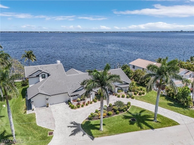 view of subject property with a nearby body of water