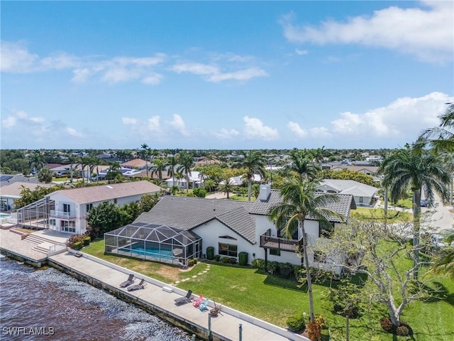 aerial view of residential area with a nearby body of water