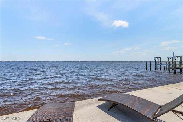 dock with a water view and boat lift