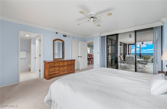 carpeted bedroom with crown molding, visible vents, ensuite bathroom, access to outside, and a ceiling fan