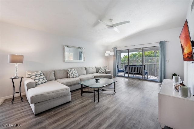 living area with baseboards, ceiling fan, wood finished floors, and visible vents