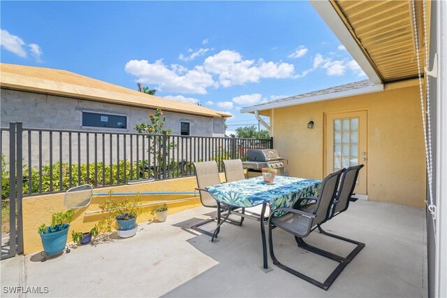 713 SW 39th Ter, Cape Coral, FL 33914 - view of patio / terrace with outdoor dining space and area for grilling