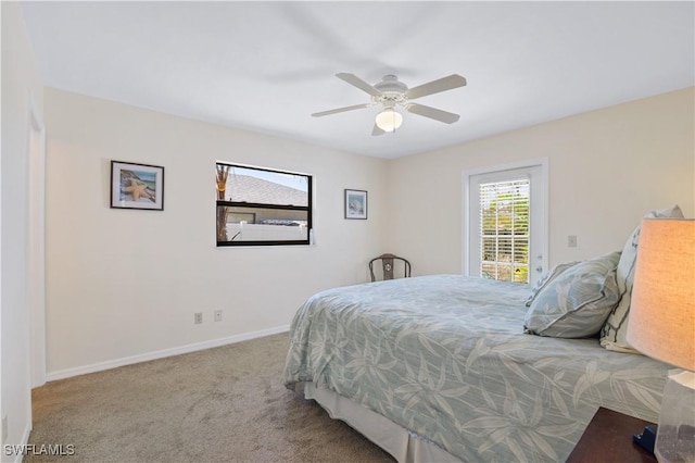 713 SW 39th Ter, Cape Coral, FL 33914 - carpeted bedroom with baseboards and a ceiling fan